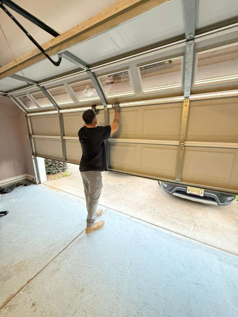 New Garage Door Installation work on a garage door
