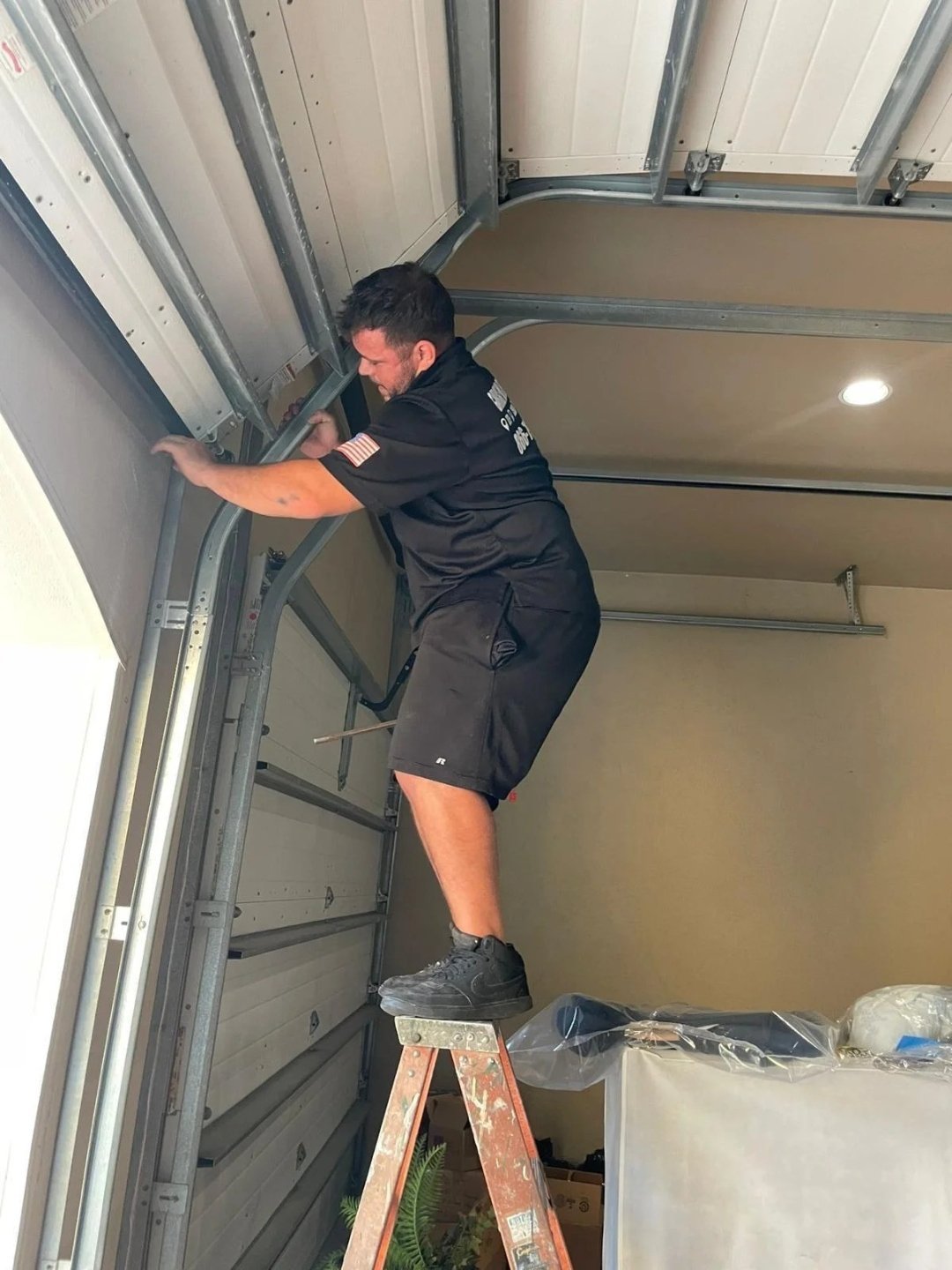 New Garage Door Installation work on a garage door